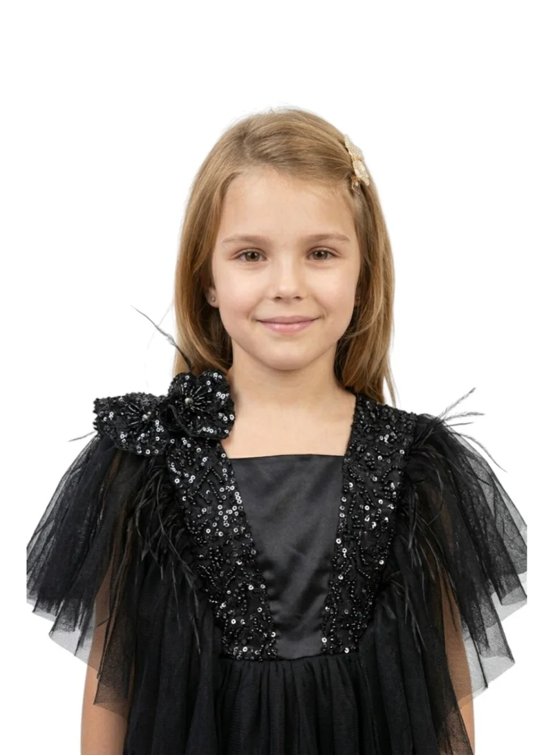 دىدانيالا فستان مطرز بالتل