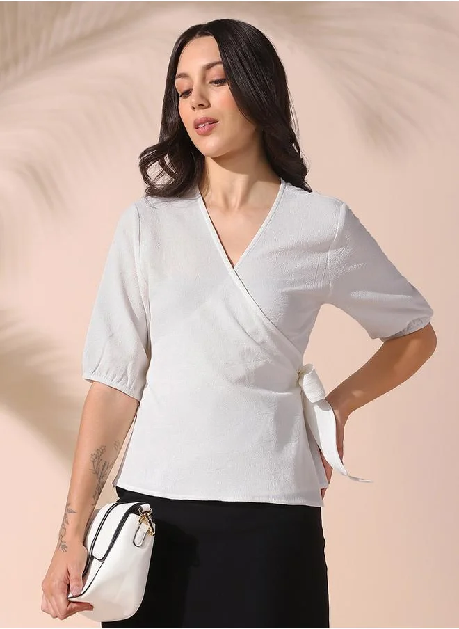 Dennis Lingo Women white regular fit solid half sleeves t-shirt polyester blend top with wrap closure- tailored to elevate your everyday.