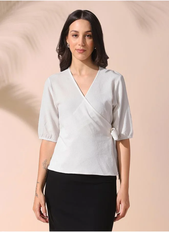Dennis Lingo Women white regular fit solid half sleeves t-shirt polyester blend top with wrap closure- tailored to elevate your everyday.