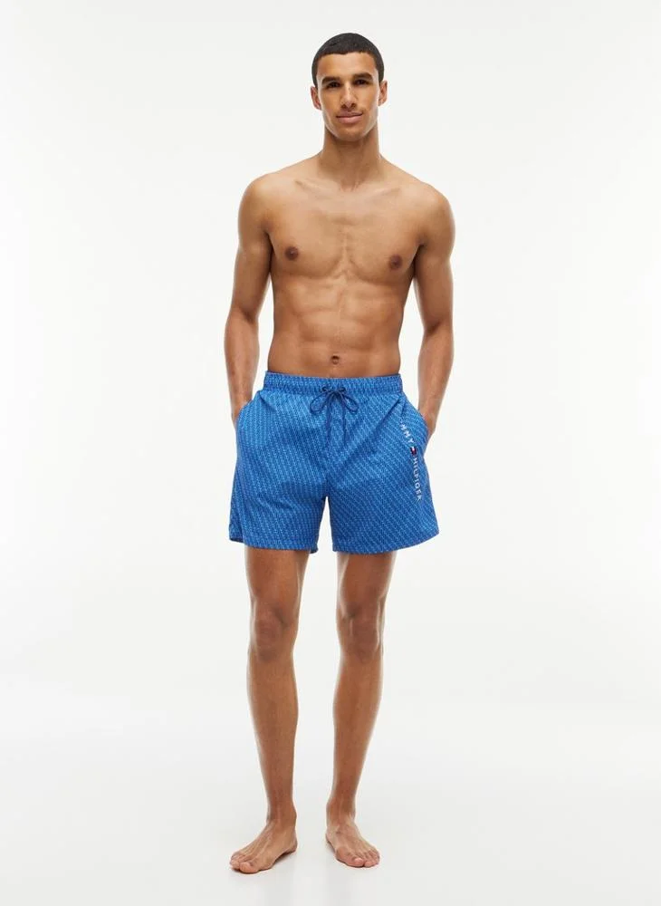 Tommy Hilfiger  Original Print Mid Length Swim Shorts for Men | Best Price UAE