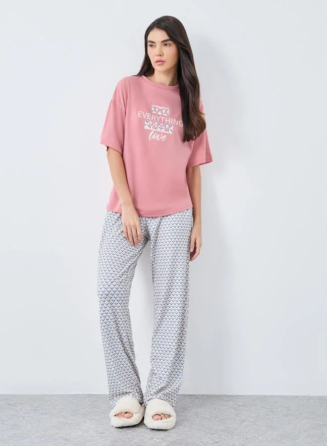 Styli Styli Slogan Drop Shoulder T-Shirt and Geo Print Pyjama Set
