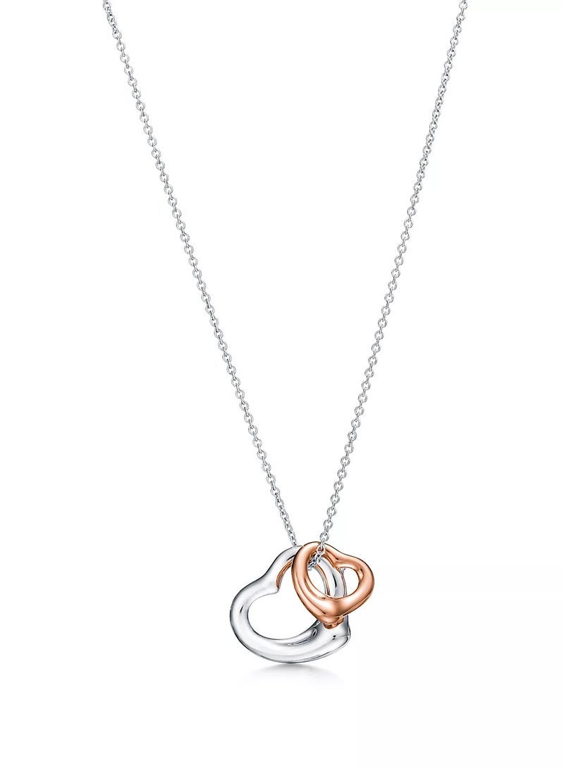 Tiffany & Co. tiffany open heart necklace in sterling silver and 18k rose gold - Image 1