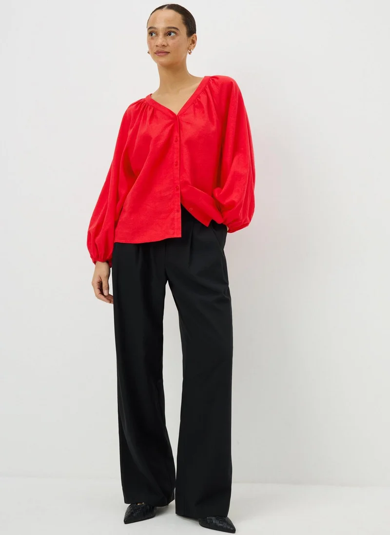 ماتلان بلوزة كتان حمراء غنية بكسرات