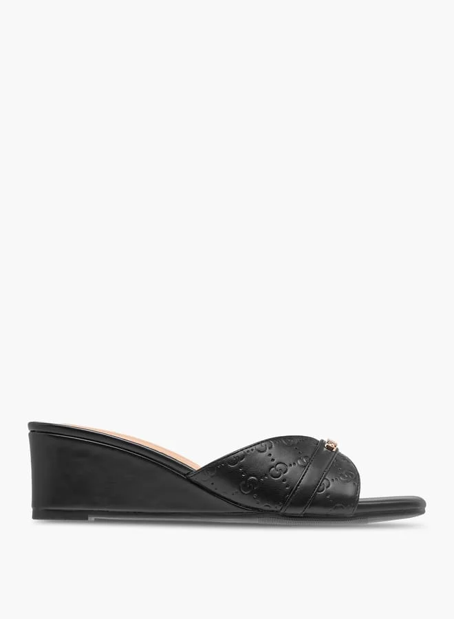 Celeste Women's Monogram Embossed Slip-On Sandals with Wedge Heels