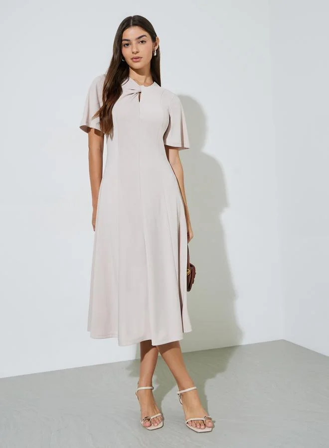 Styli  Beige Solid Short Sleeves A-Line Midi Dress for Women | Best Price UAE