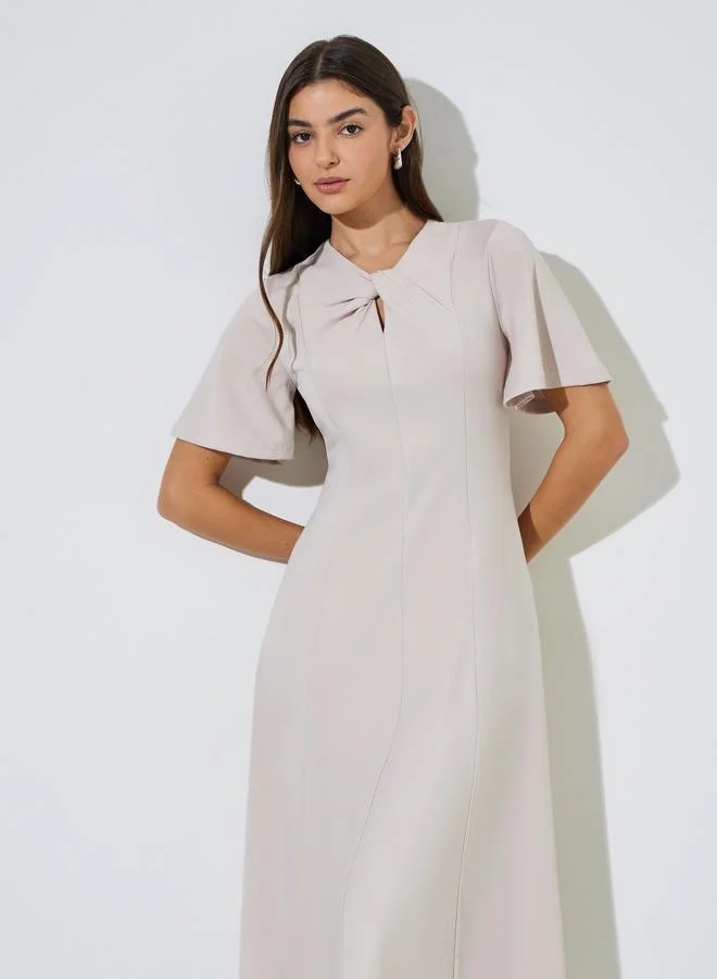 Styli  Beige Solid Short Sleeves A-Line Midi Dress for Women | Best Price UAE