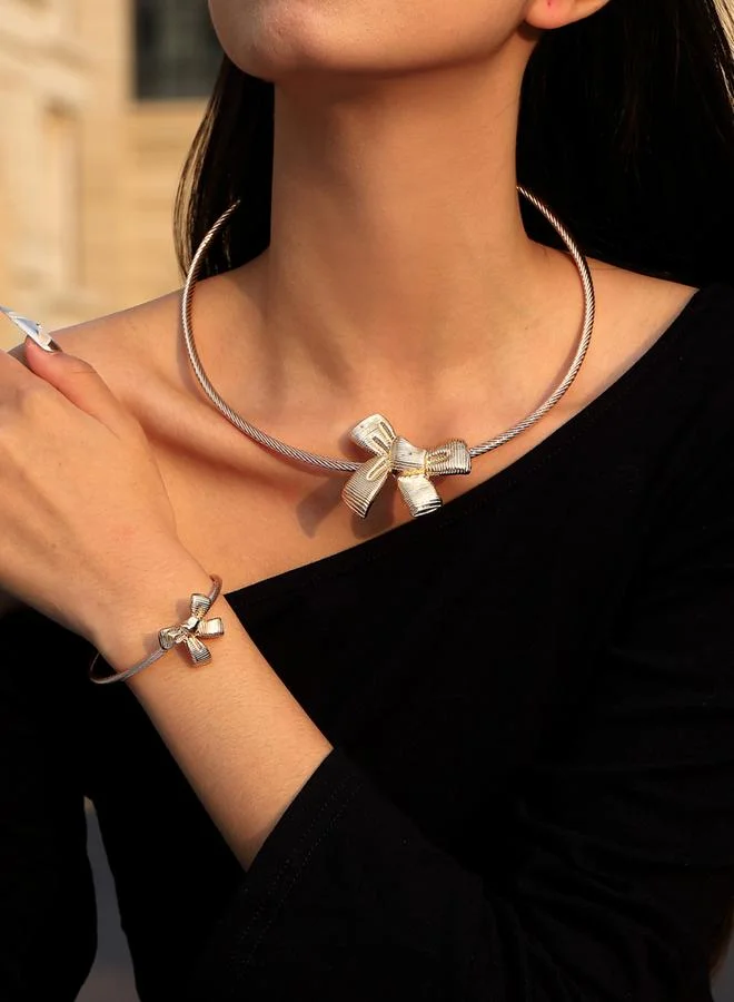 تايك تو مجموعة من 2 - عقد بتفصيلة فيونكة وسوار ذهبي