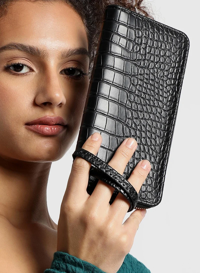 صوص هاوت محفظة جلد نباتي أسود مزخرف