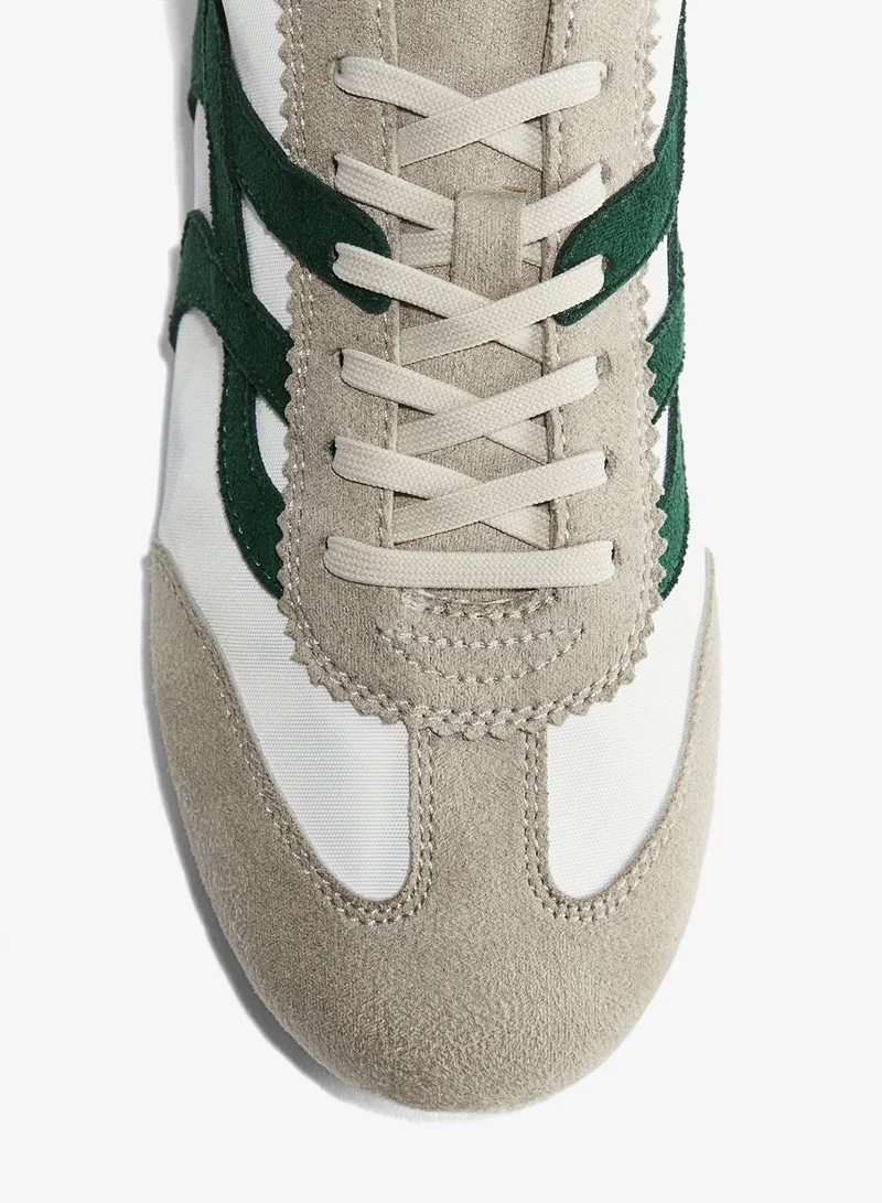 اتش اند ام حذاء رياضي