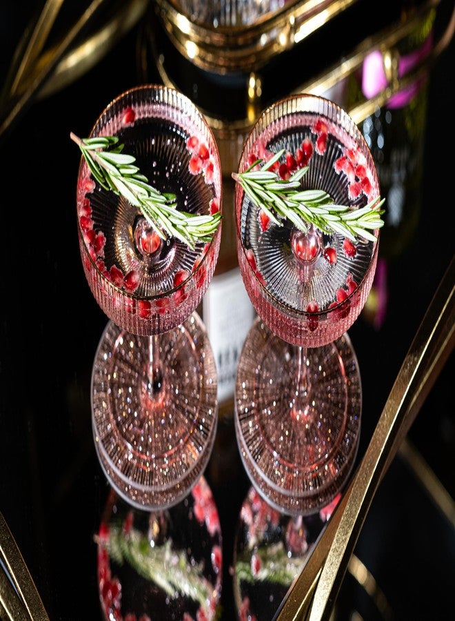 GLASSIQUE CADEAU مجموعة أكواب كوكتيل كريستالية مضلعة من GLASSIQUE CADEAU بتصميم آرت ديكو عتيق، لون وردي فاتح مع حواف ذهبية | 4 أكواب | سعة 7 أونصات، مثالية لشرب الشمبانيا، المارتيني، والكوزموبوليتان | صحون أنيقة - Image 5