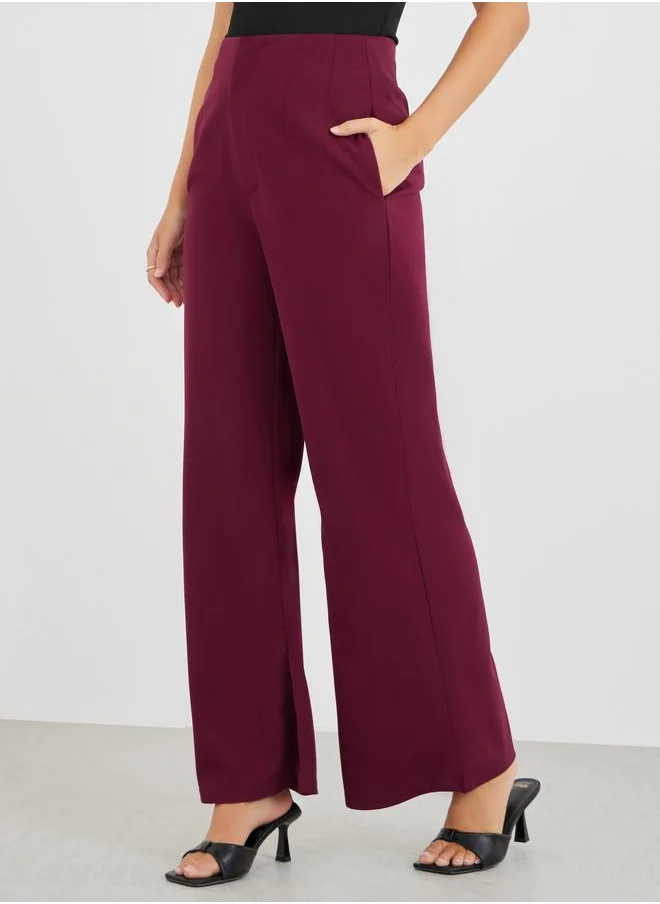 Styli Styli Solid Mid Rise Flare Fit Pants