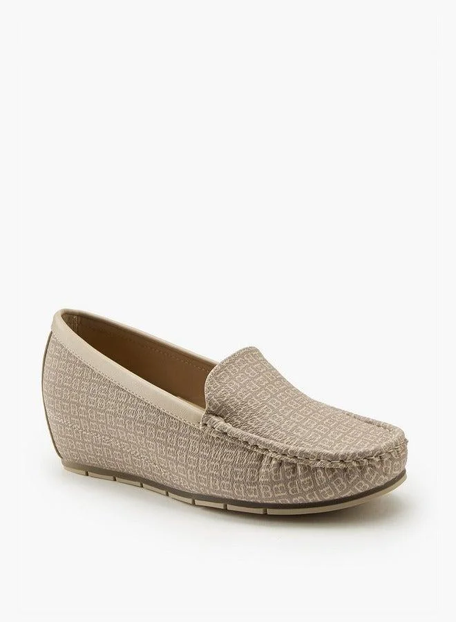 فلورا بيلا من شو إكسبرس حذاء لوفر إسفين بنمط شعار مطبوع بالكامل