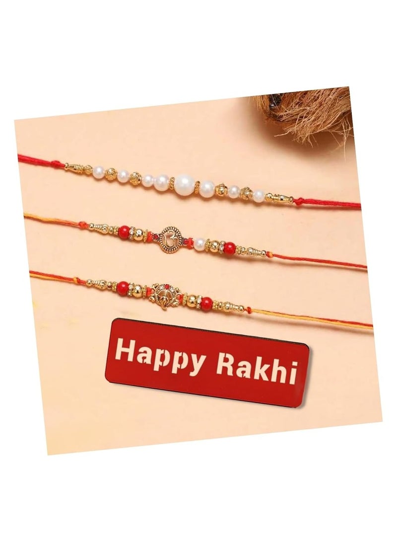 كرافت مجموعة من 3 لآلئ ذهبية وحمراء وبيضاء من eCraftIndia، رمز أوم، راكهي دينية مصممة للرب غانيشا، راكهي خشبية مقطوعة مع عبوة رولي تشاوال - راكهي للأخ، أخي، أخي - Image 1