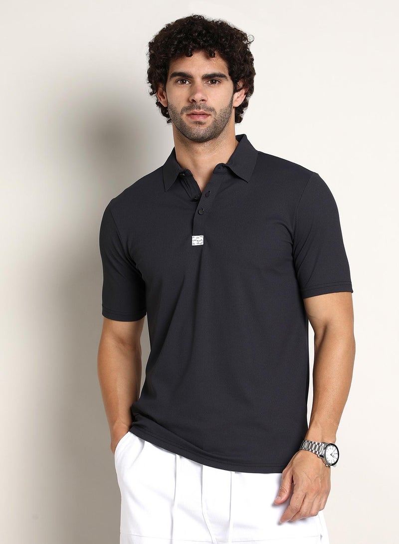 Campus Sutra Campus Sutra Men's Midnight Black Seamless Ribbed Polo T-Shirt For Casual Wear | Polo Neck | Short Regular Sleeves | Half-Button Closure | T-Shirt Crafted With Comfort Fit For Everyday Wear - Image 2