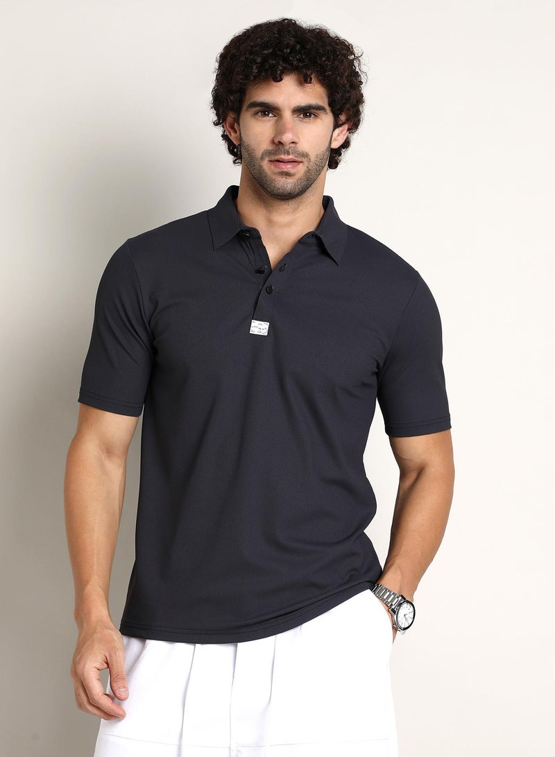 Campus Sutra Campus Sutra Men's Midnight Black Seamless Ribbed Polo T-Shirt For Casual Wear | Polo Neck | Short Regular Sleeves | Half-Button Closure | T-Shirt Crafted With Comfort Fit For Everyday Wear - Image 3
