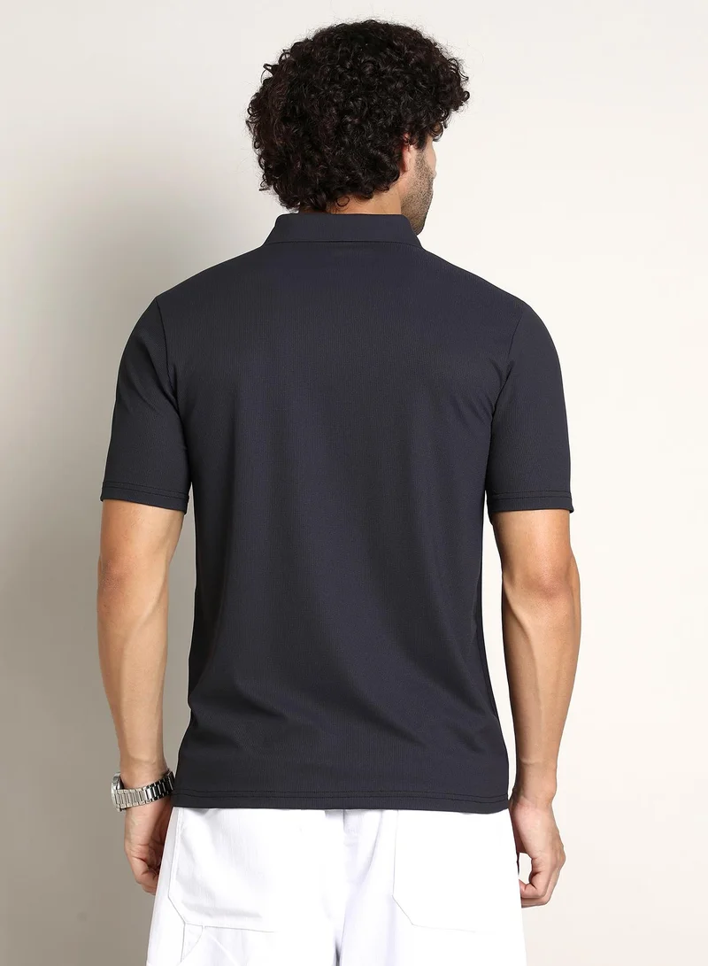 Campus Sutra Campus Sutra Men's Midnight Black Seamless Ribbed Polo T-Shirt For Casual Wear | Polo Neck | Short Regular Sleeves | Half-Button Closure | T-Shirt Crafted With Comfort Fit For Everyday Wear