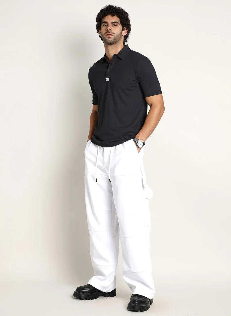 Campus Sutra Campus Sutra Men's Midnight Black Seamless Ribbed Polo T-Shirt For Casual Wear | Polo Neck | Short Regular Sleeves | Half-Button Closure | T-Shirt Crafted With Comfort Fit For Everyday Wear
