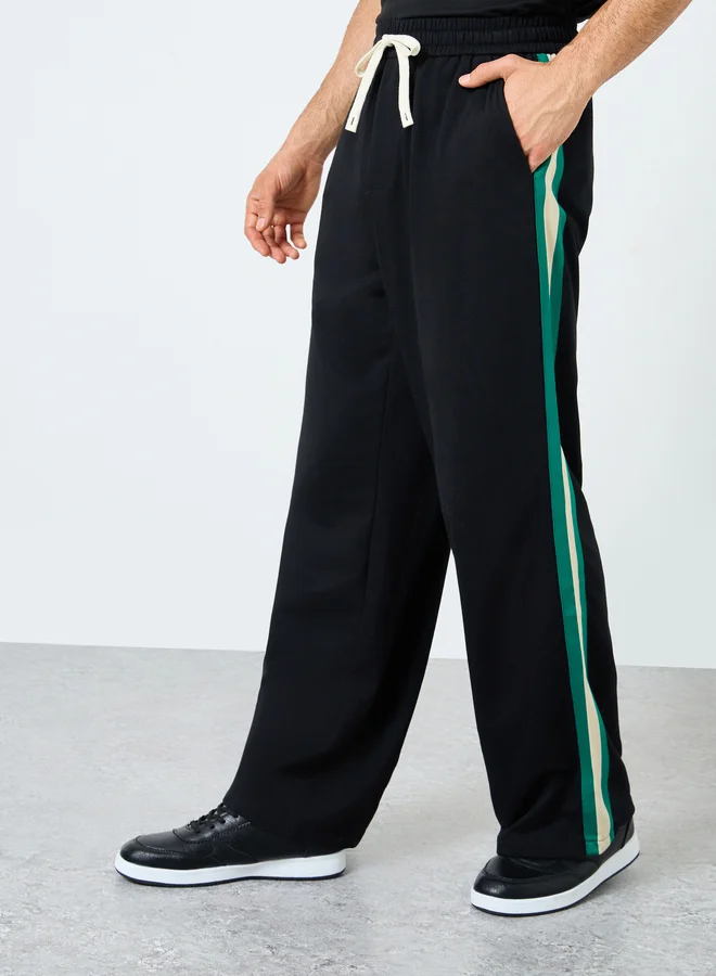 Styli Styli Relaxed Fit Open Hem Joggers with Side Tape and Badge Detail