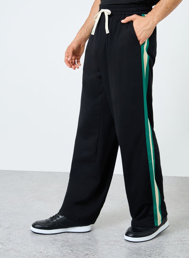 Styli Relaxed Fit Open Hem Joggers with Side Tape and Badge Detail - Image 3