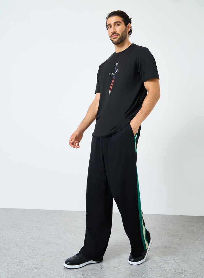 Styli Relaxed Fit Open Hem Joggers with Side Tape and Badge Detail - Image 2