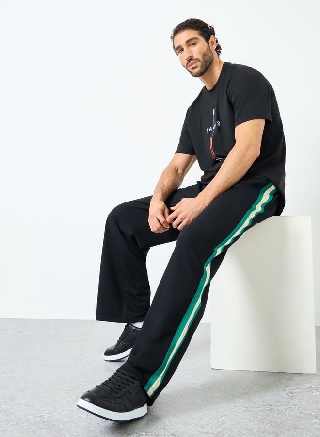 Styli Relaxed Fit Open Hem Joggers with Side Tape and Badge Detail - Image 1