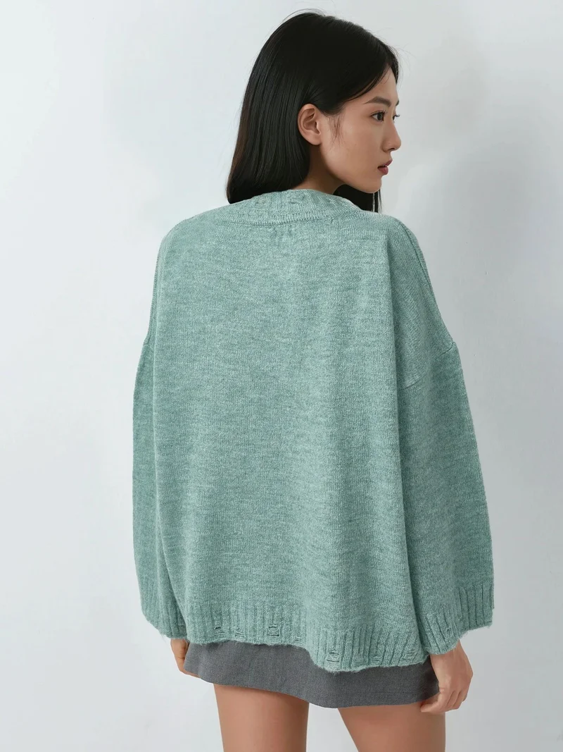 موضتي كنزة صوفية كبيرة الحجم بنقش بارز وياقة دائرية من