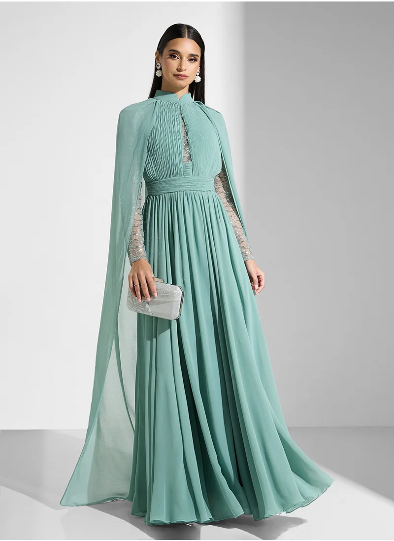 Namshi x Shimmer Sleeve Dress With Cape