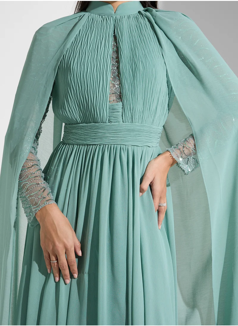 Namshi x Shimmer Sleeve Dress With Cape