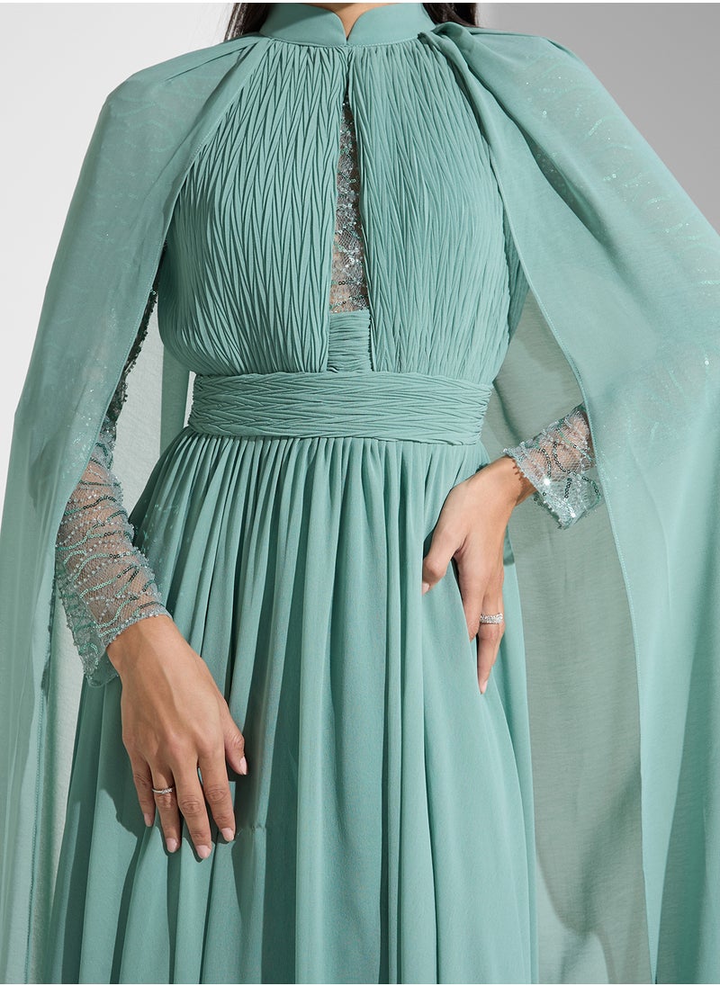 Namshi x Shimmer Sleeve Dress With Cape  - Image 4