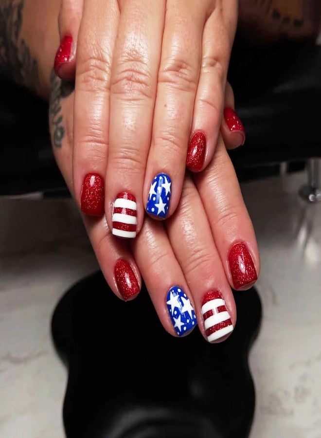 KKUUOO 24Pcs 4th of July Patriotic Press on Nails,Short Square Fake Nails with American Flag Glitter Designs Full Cover Acrylic Glossy Stick on Nails Independence Day Press ons for Women Nail Art - Image 1