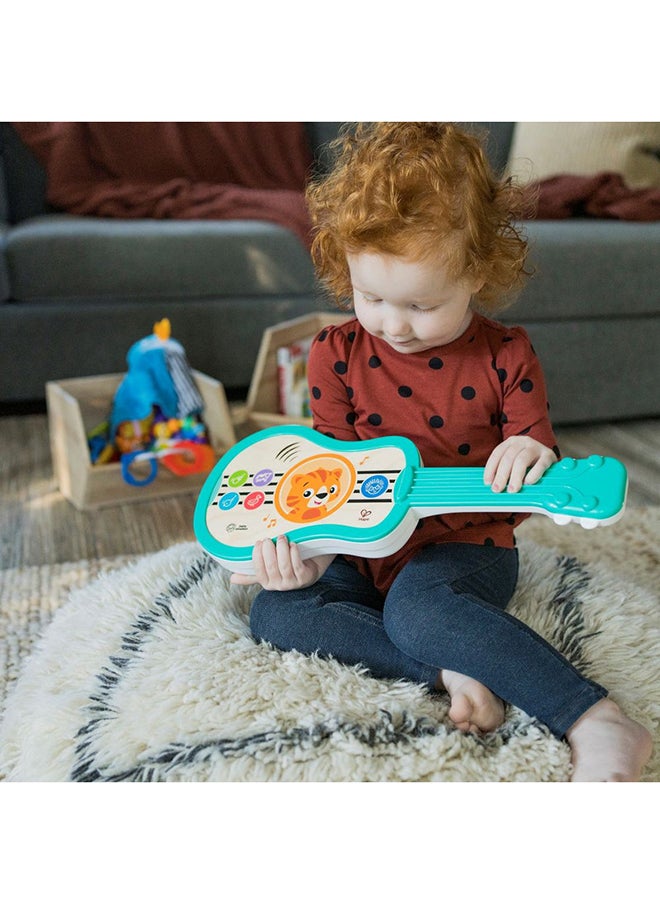 Baby Einstein Sing & Strum Magic Touch Ukulele Wooden Musical Toy, Ages 6 Months+, Multicolored  - Image 4