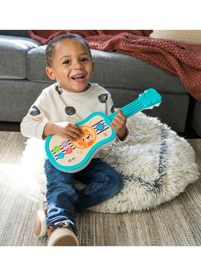 Baby Einstein Sing & Strum Magic Touch Ukulele Wooden Musical Toy, Ages 6 Months+, Multicolored  - Image 2