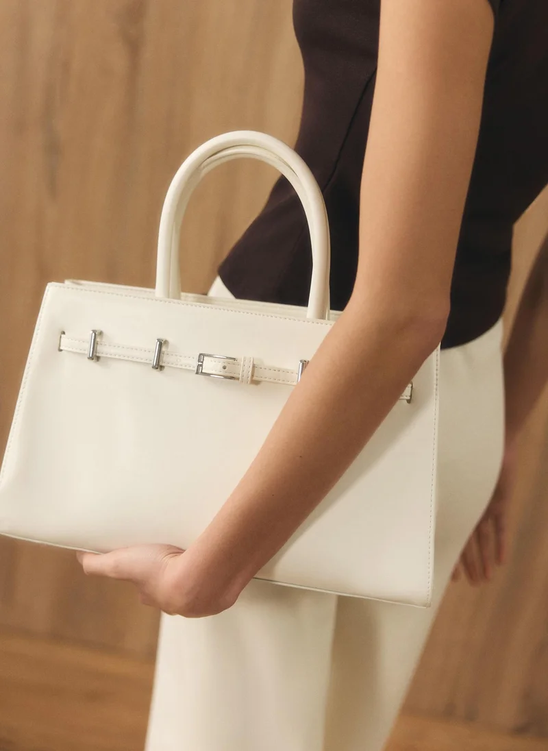 Rectangular bag with decorative strap