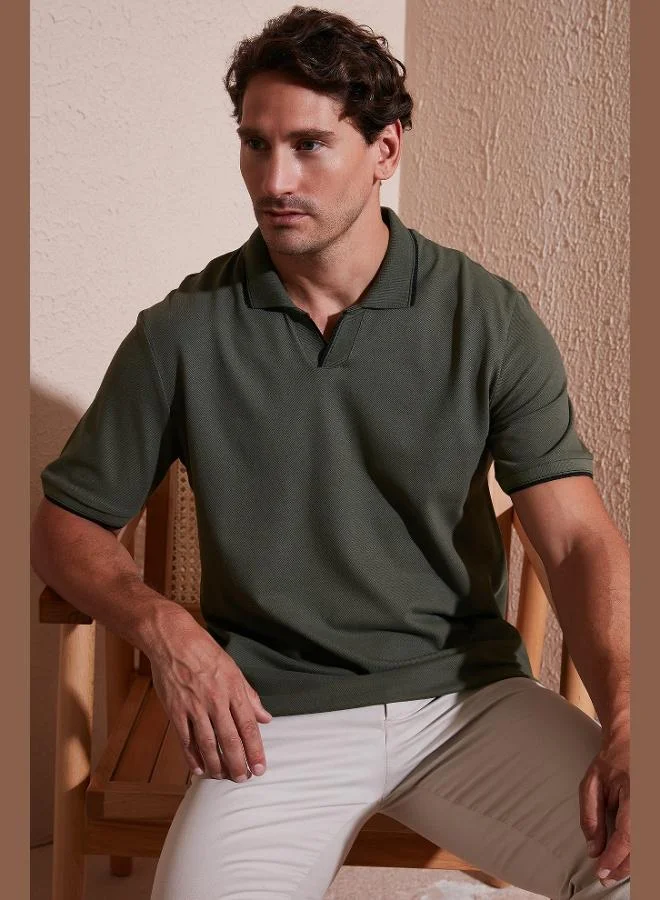 بوراتي تيشيرت بولو رجالي قطن بقصة عادية وتفاصيل خطوط