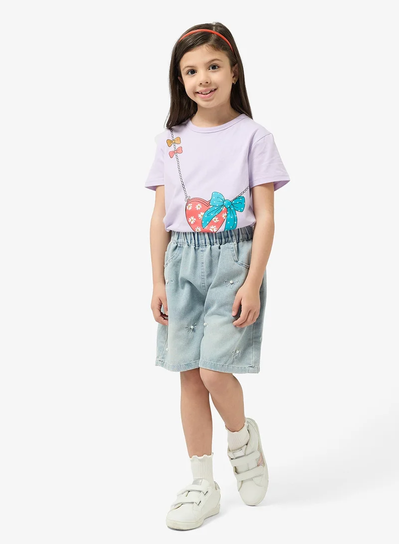 Pinata  Bow-Pearl Embellished Denim Shorts for Women | Best Price UAE