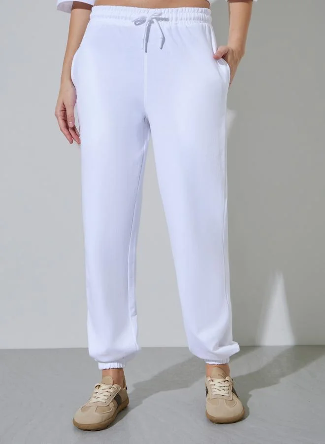 ستايلي White Solid Wide Leg Tapered Joggers