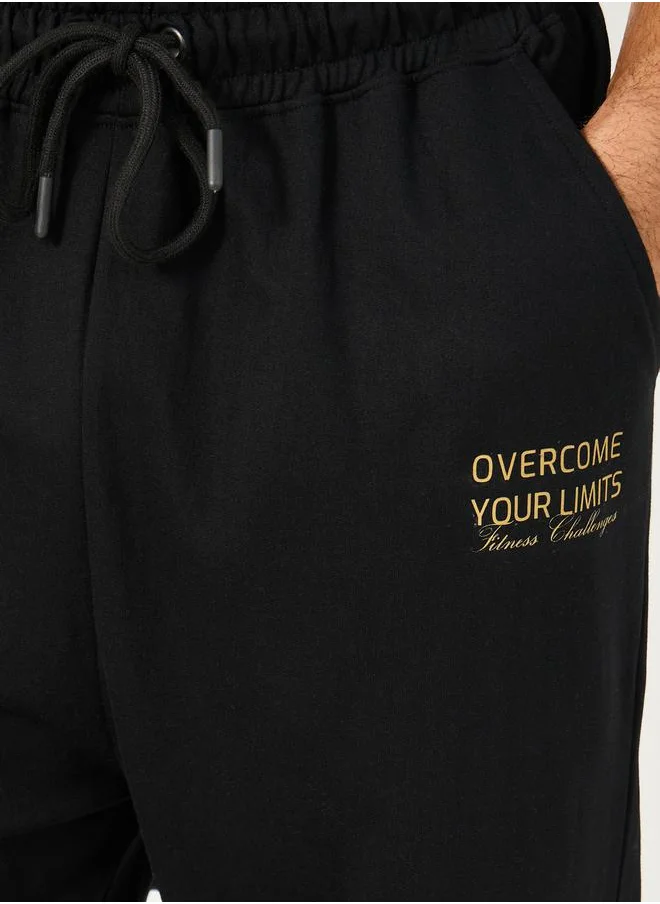 Styli Oversized T-Shirt and Slogan Print Joggers Training Set