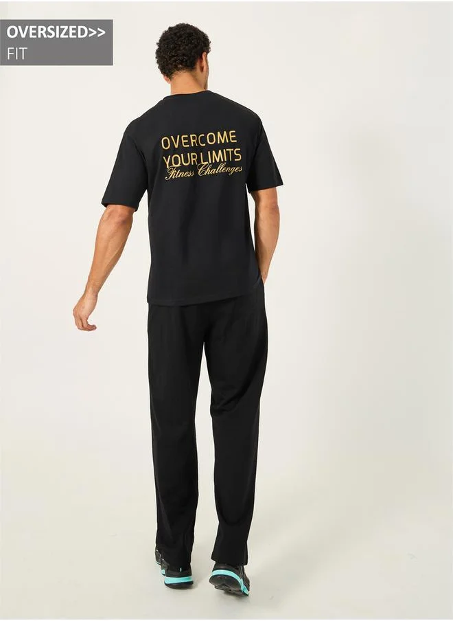 ستايلي Oversized T-Shirt and Slogan Print Joggers Training Set