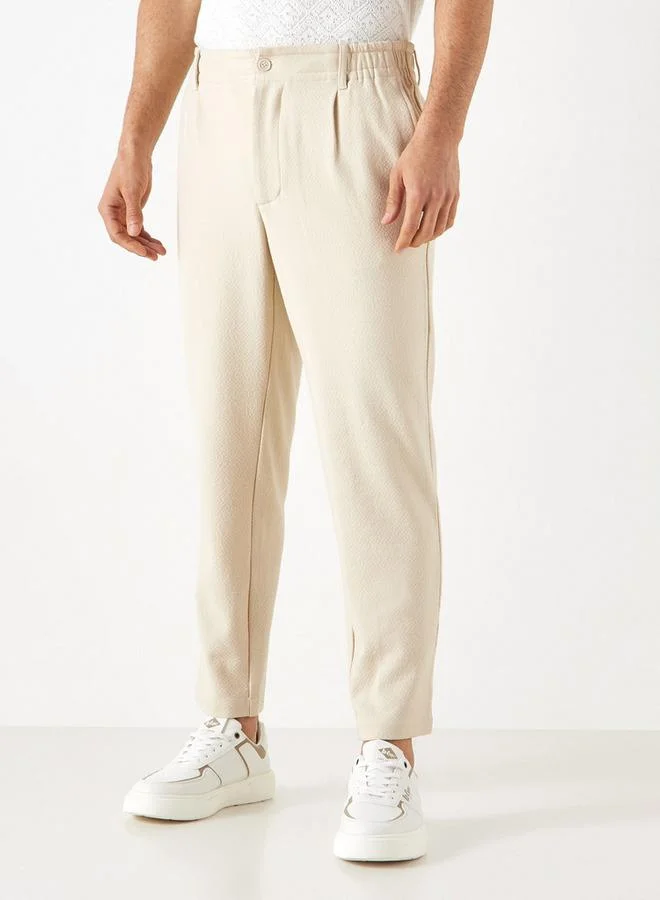 ايكونيك بنطلون سادة بِخصر مرن وقصّة عادية من آيكونيك