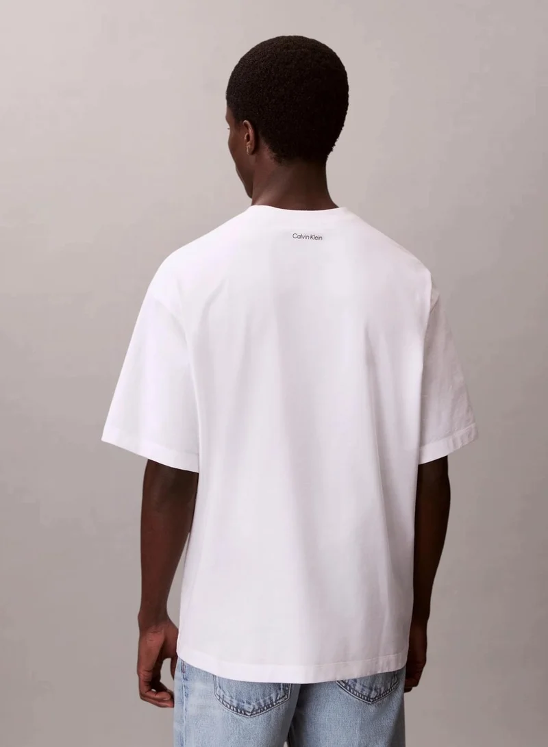 Calvin Klein Bright White Dual Logo Graphic Relaxed T-Shirt for Men | Best Price UAE