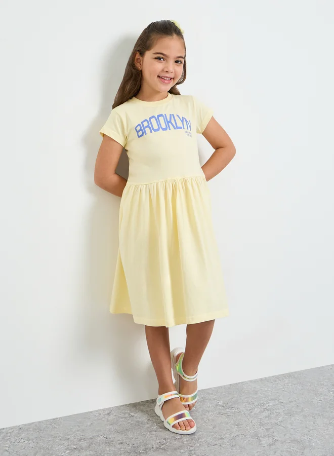 Styli Girls Text Print Round Neck T-Shirt Dress