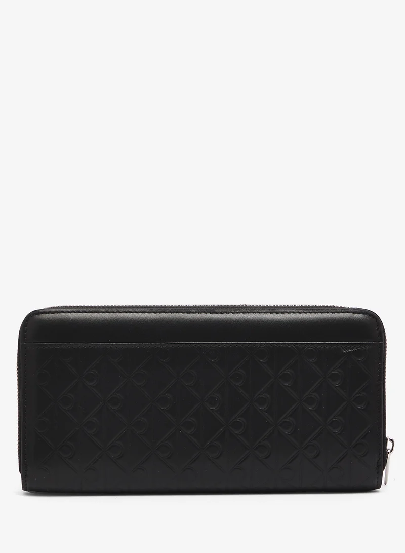 CALVIN KLEIN  Embossed Aop Long Zip Around Wallet for Women | Best Price UAE