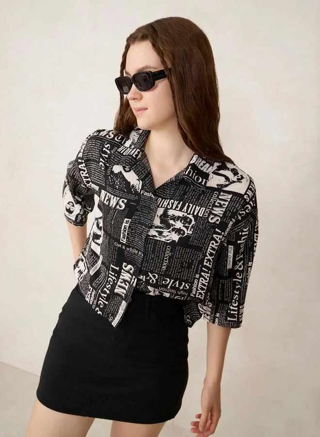 أوجيدر بلوزة قصيرة بطبعة كتابة