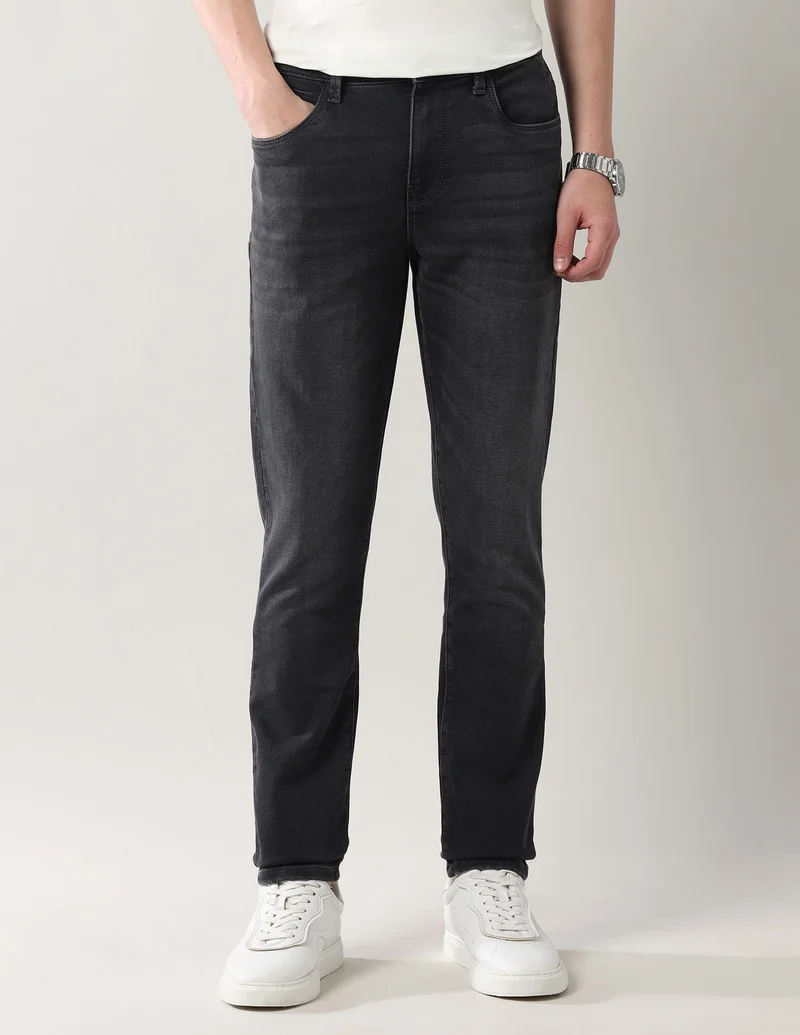 Slim Tapered Fit Mid Rise Jeans