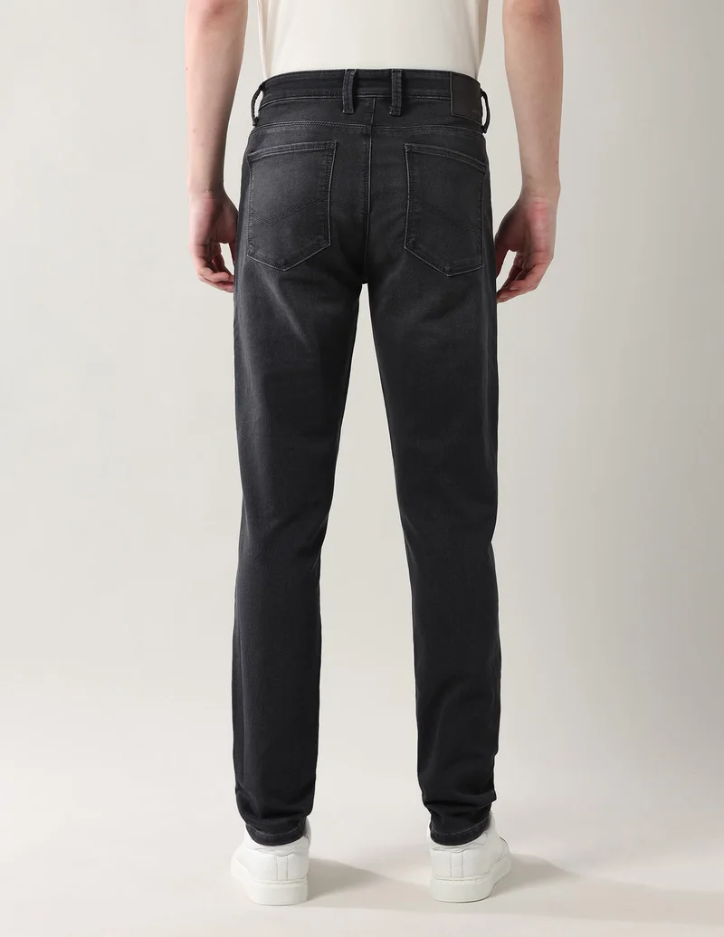 Arrow Black Slim Tapered Fit Mid Rise Jeans for Men | Best Price UAE
