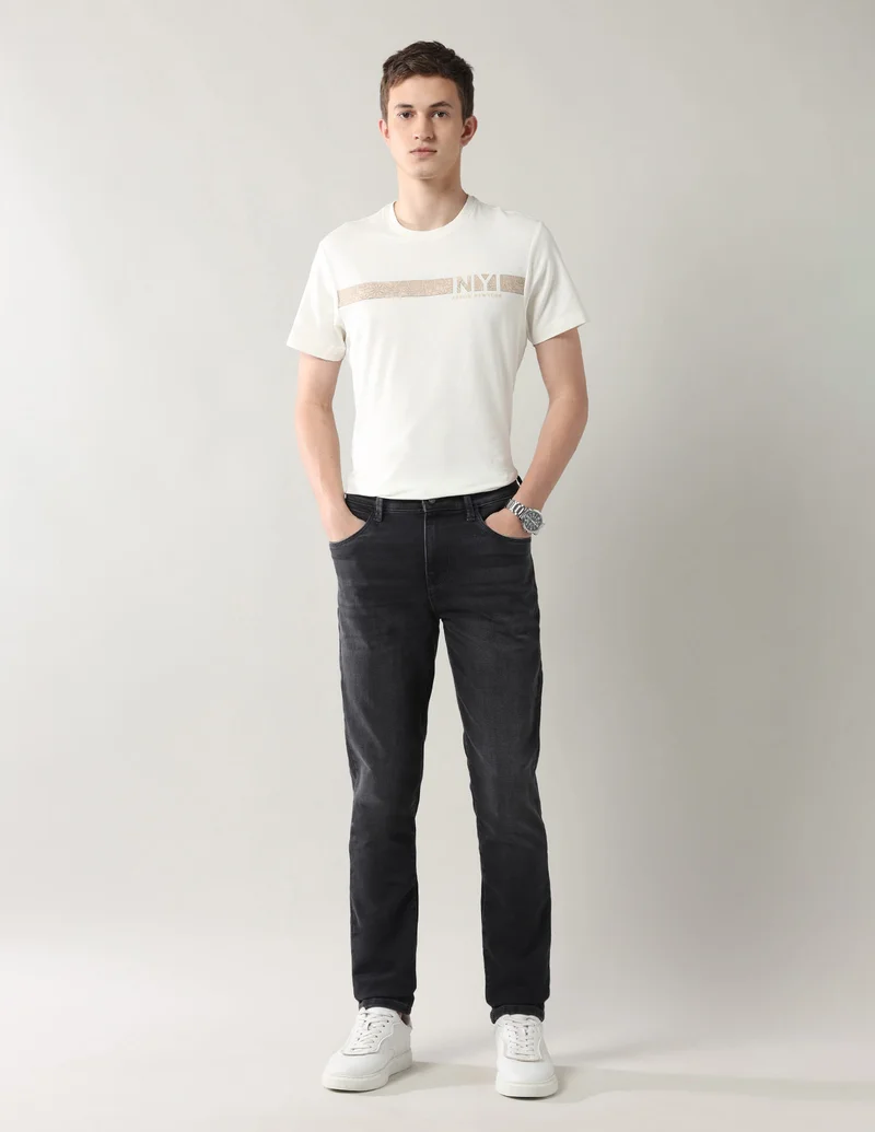 Arrow Black Slim Tapered Fit Mid Rise Jeans for Men | Best Price UAE
