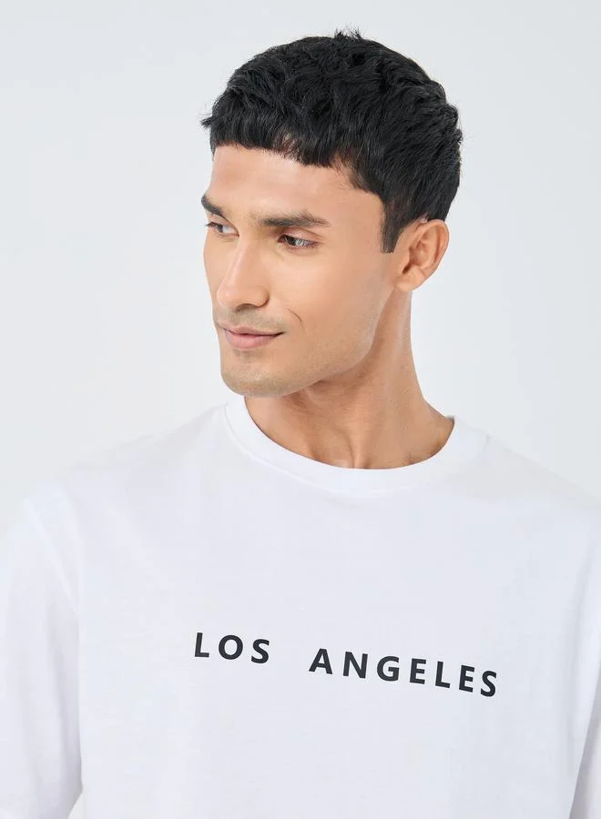 Styli Slogan Print Crew Neck Oversized T-Shirt