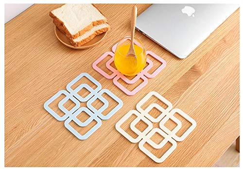 HARI - Silicone Trivet Mats and Hot Pads, (Set of 4) Heat Resistant, Non-Slip Pot Holders - Image 1