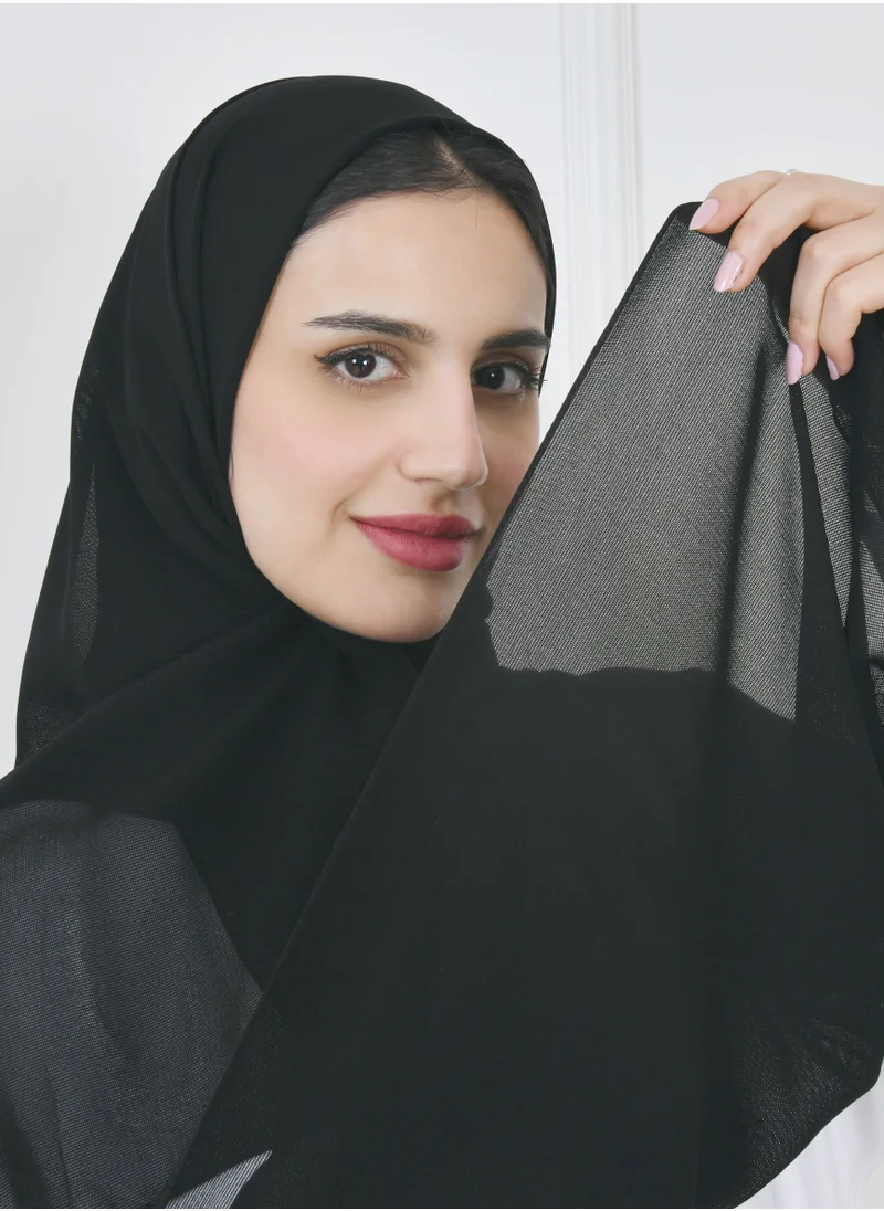 HAWRAA ABAYA A black gauze veil