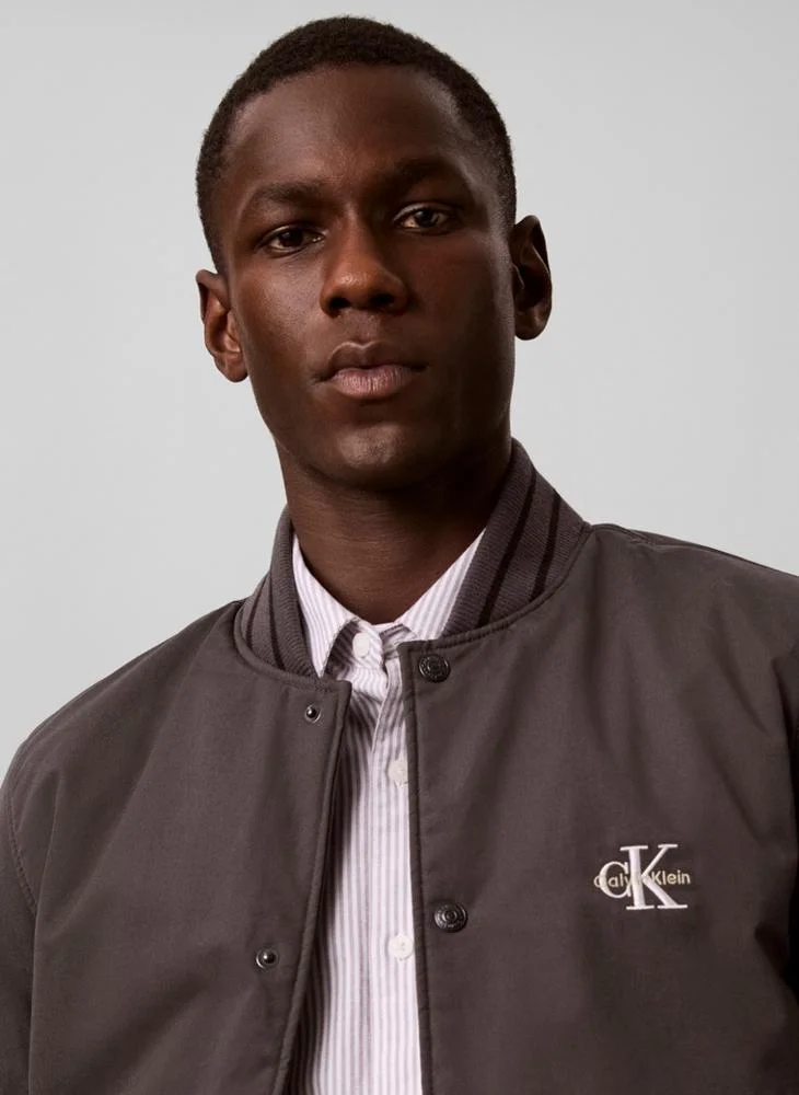 Calvin Klein Jeans  Material Mix Varsity Bomber Jacket for Men | Best Price UAE